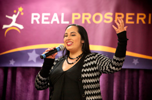 Photo of PJ Van Hulle speaking onstage