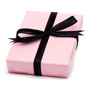 Image of pink gift with black ribbon